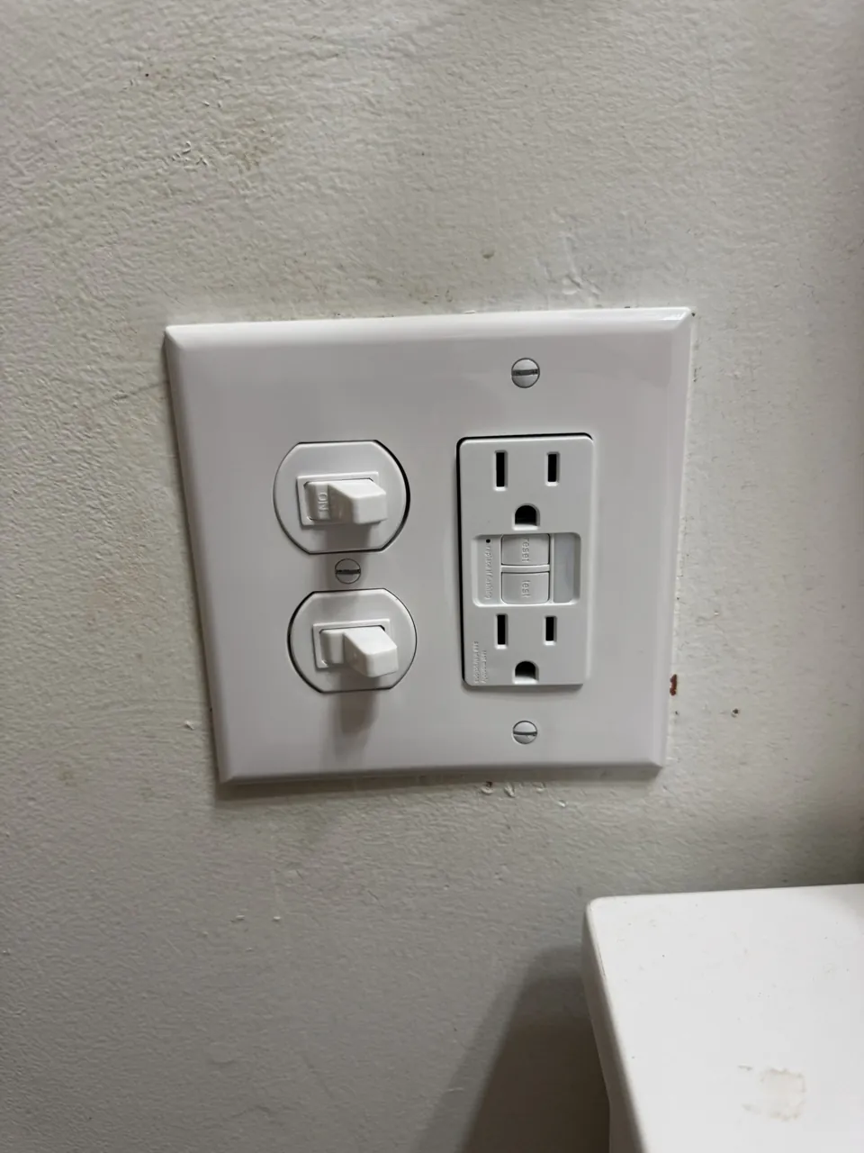 The finished wall controls and outlet.