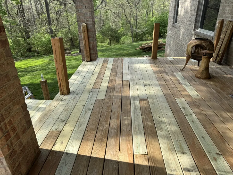 New deck boards in place before the railing installation.