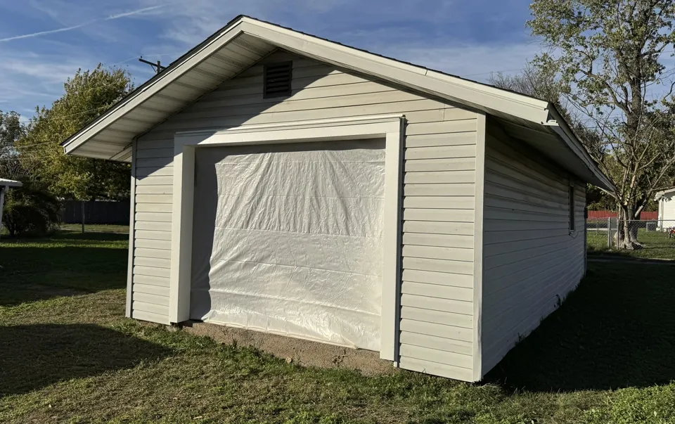 The garage opening covered while work was underway.