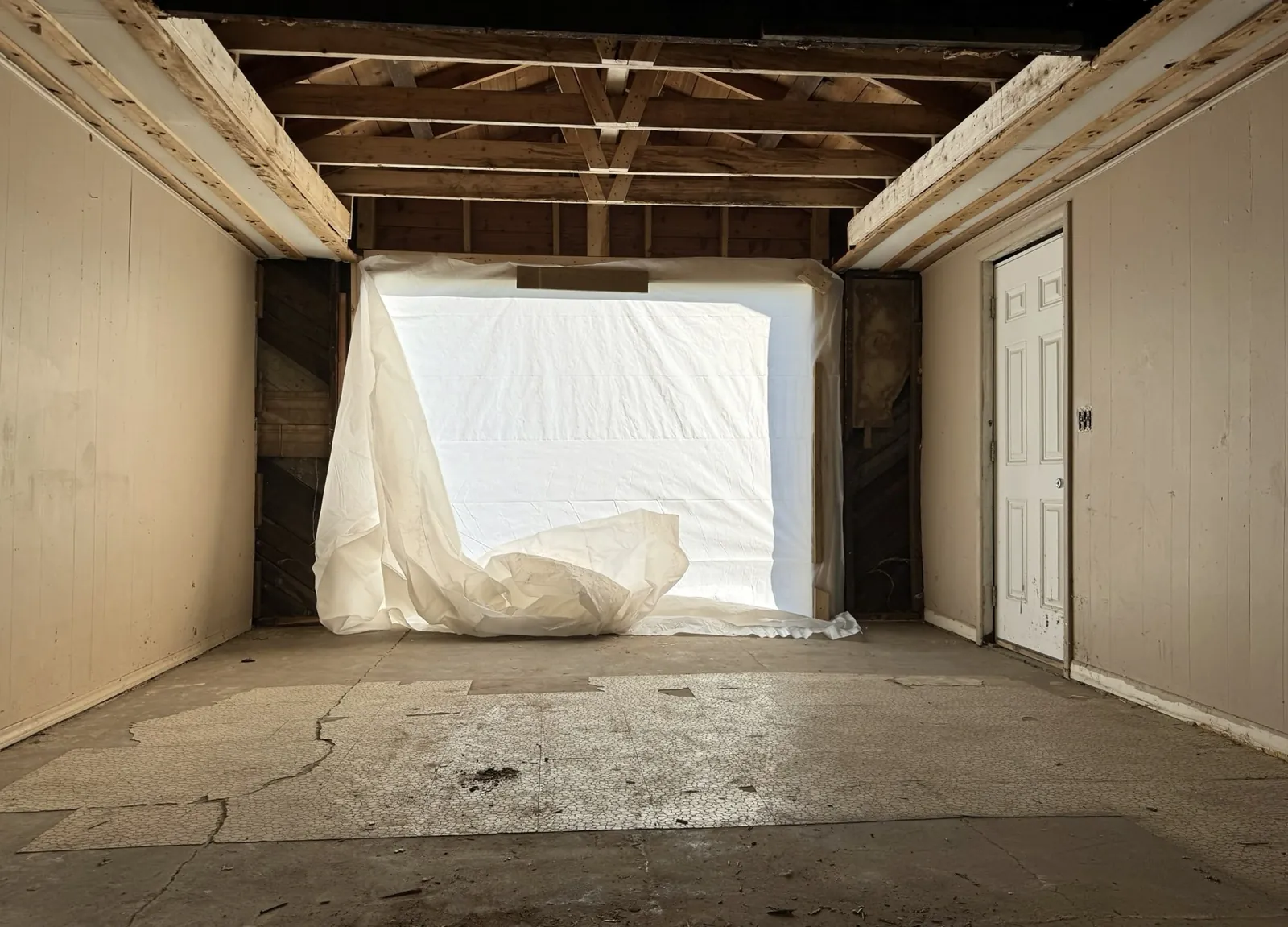 The opened interior and garage opening during the November conversion work.