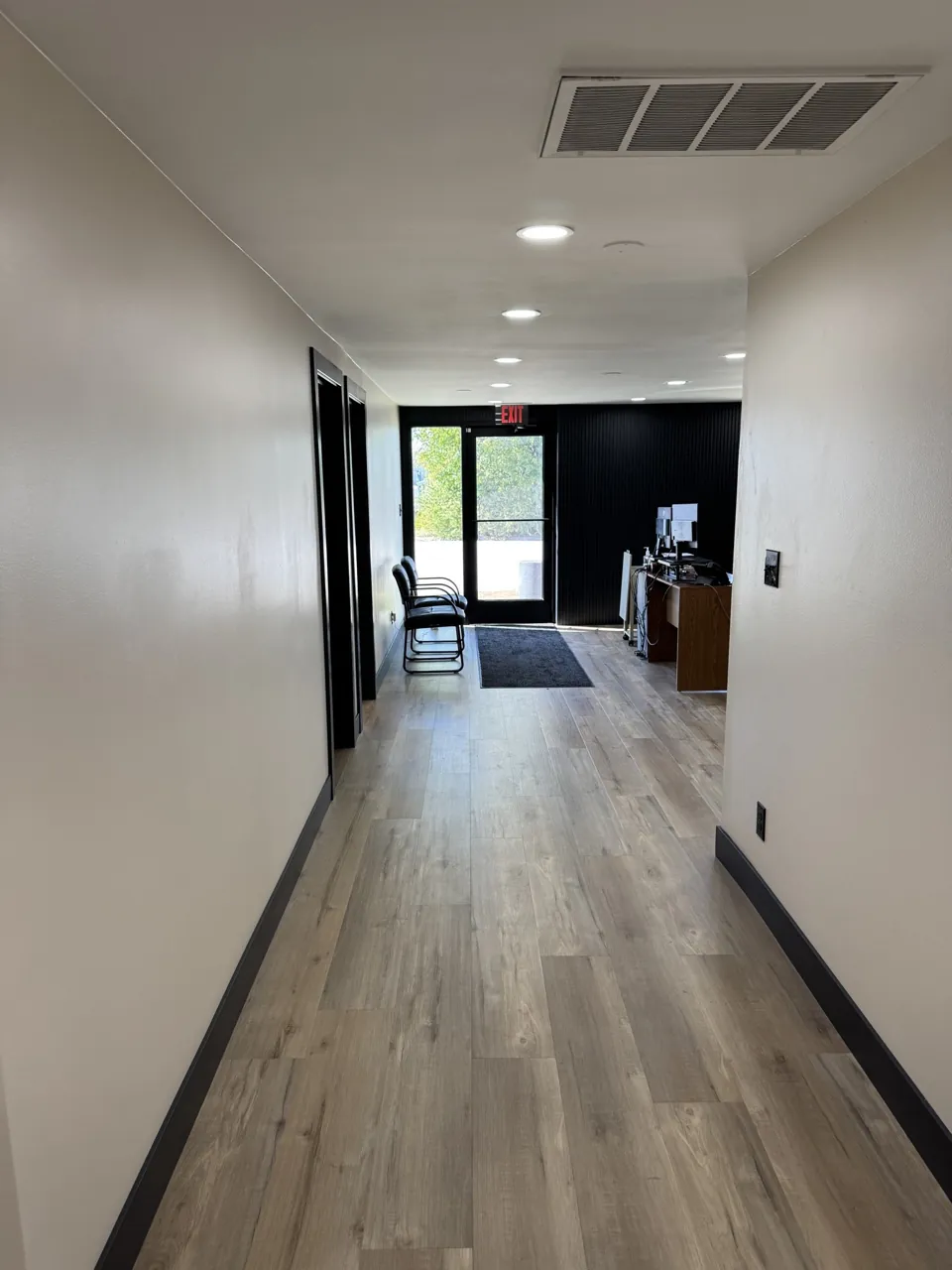 The office hallway and coordinated interior finishes.
